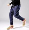 Irukite men's high waist loose winter trousers in black with belt and zip fly, plus velvet lined