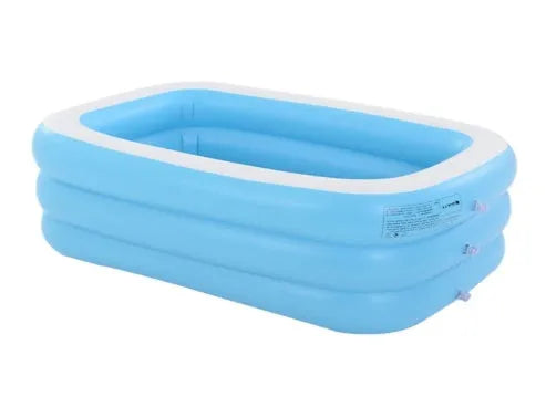Blue and white rectangular inflatable PVC swimming pool 150cm x 110cm x 50cm in a garden setting