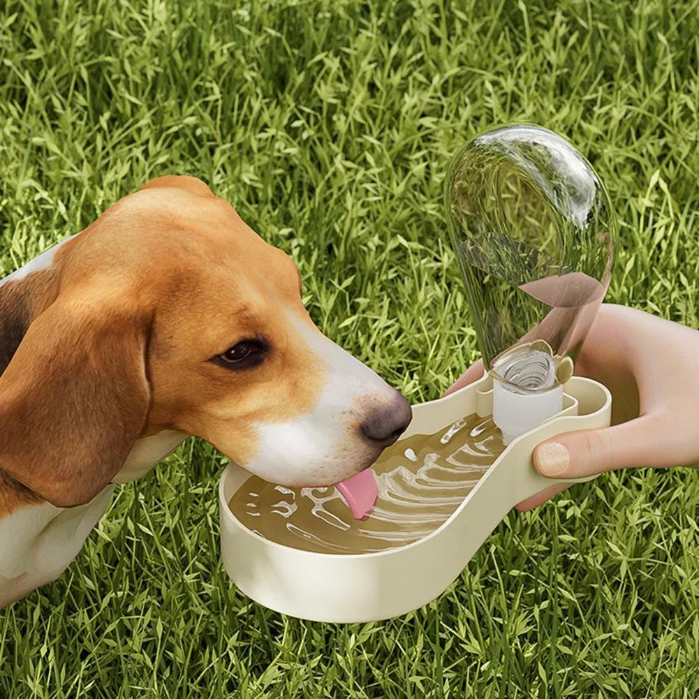 Orange and white portable pet water feeder with 200ml bottle and separate food container for dogs and cats