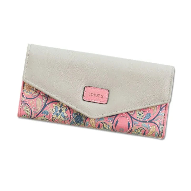 Women's three-fold leather wallet with buckle closure in black, blue, green, melon red or violet