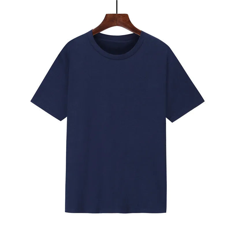 A man's loose-fitting black cotton t-shirt with short sleeves laid flat.