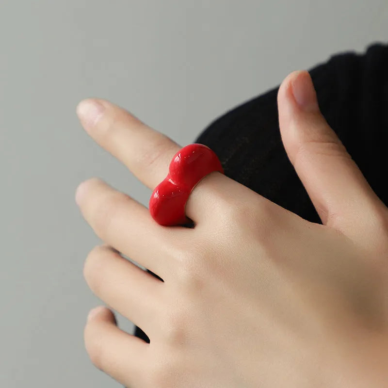 Heart-shaped three-dimensional enamel ring in zinc alloy showing raised colourful design