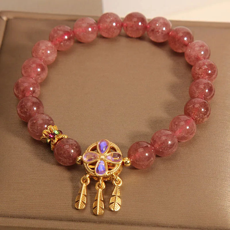 Women's strawberry quartz bracelet with four-leaf clover dream catcher pendant