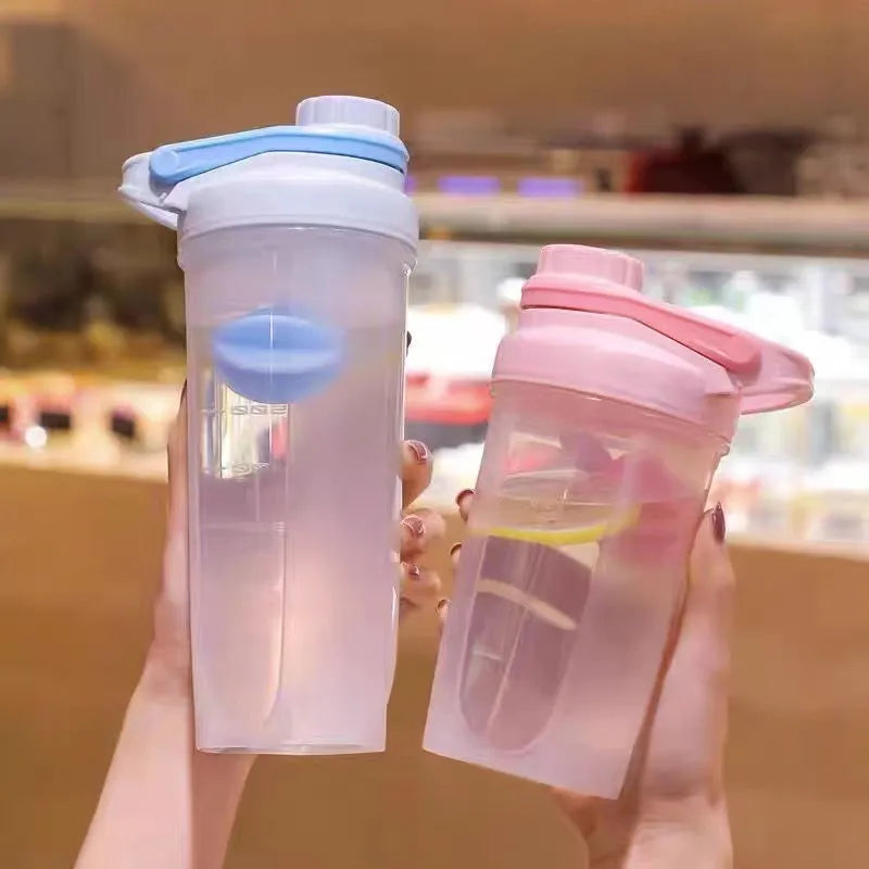 Blender shaker bottle with stirring ball, leakproof knob closure, available in purple, blue, pink, yellow, grey, 500ml and 700ml sizes