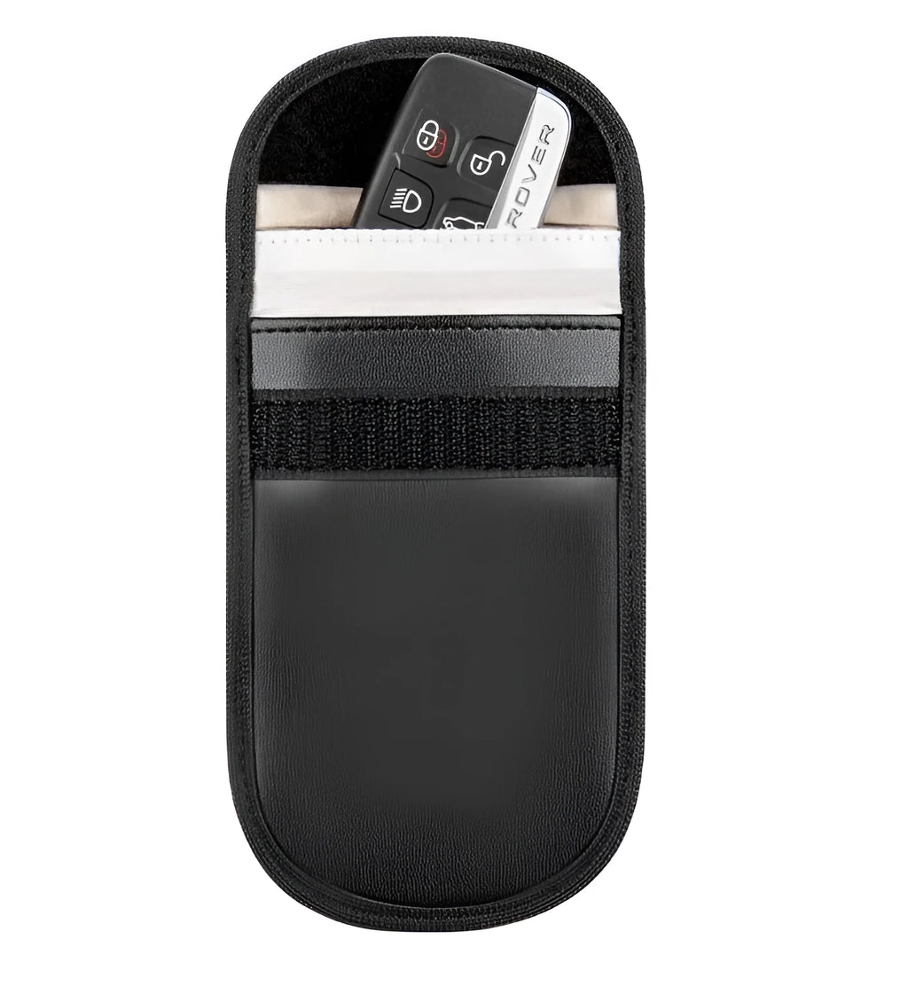 Black microfiber Faraday cage car key signal blocker case measuring 13.5 by 9.5 centimetres.