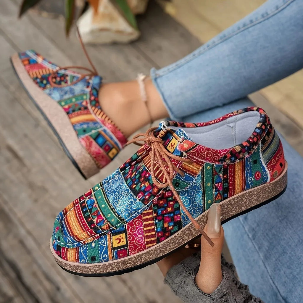 Thick-soled colorful ethnic retro sneakers in blue with fabric upper and rubber sole