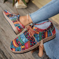 Thick-soled colorful ethnic retro sneakers in blue with fabric upper and rubber sole