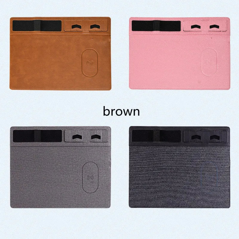 Pink wireless charging mouse pad with phone on charging area and mouse on PU leather surface