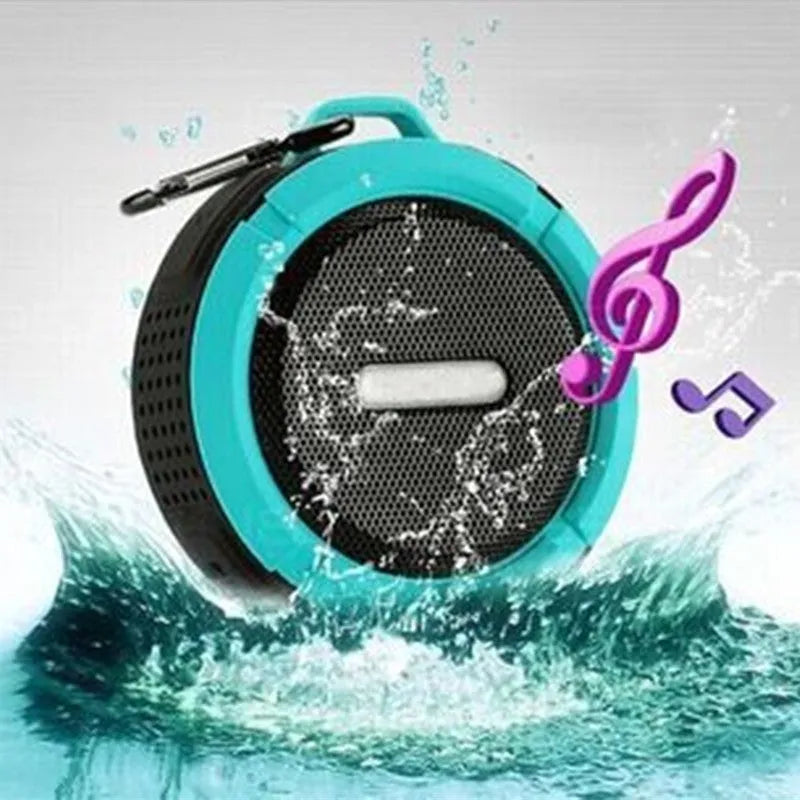 Portable waterproof Bluetooth speaker in multiple colours with bag clip for outdoor use