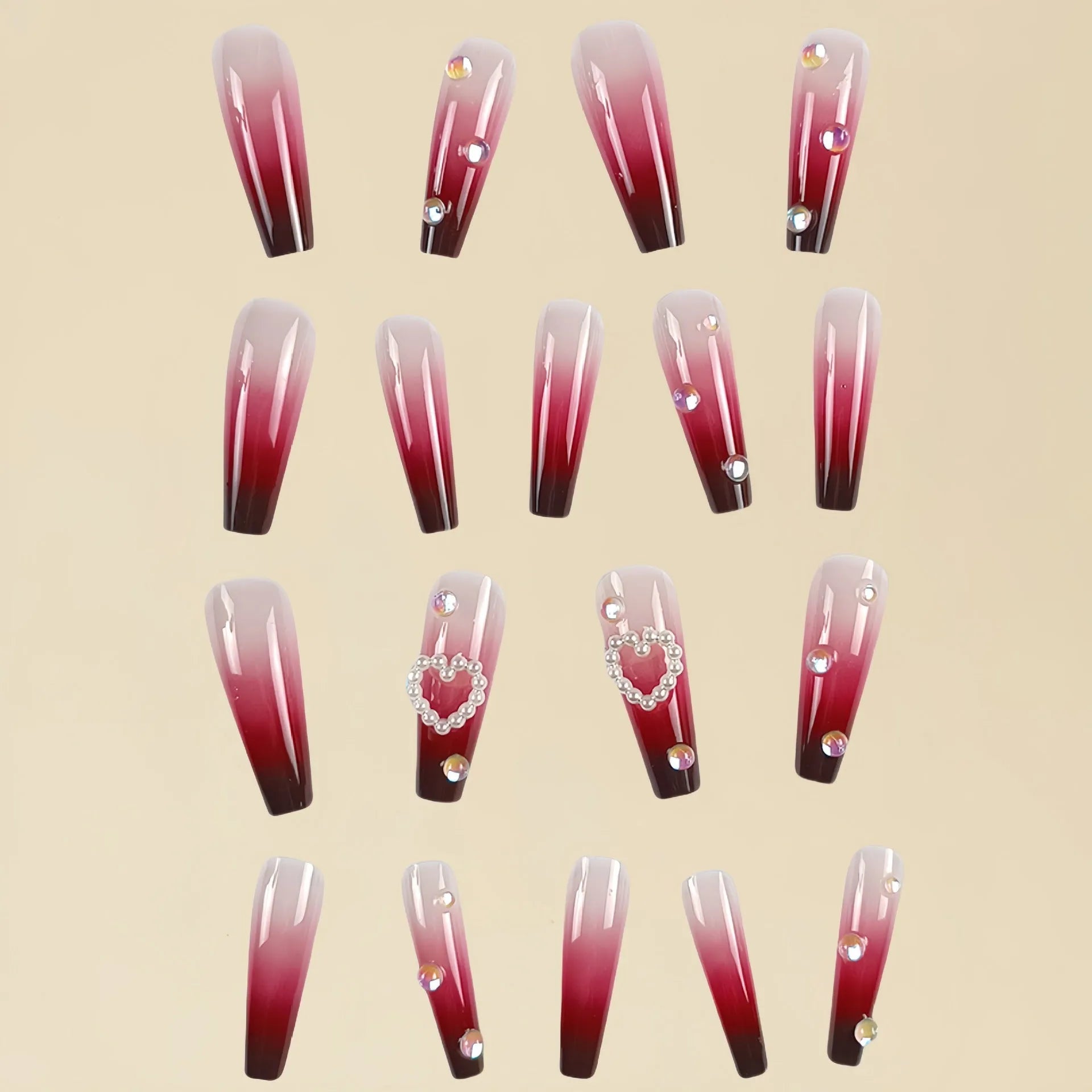 Wine red gradient fake nail tips with plaid pattern in long ballet style displayed with jelly glue applicator