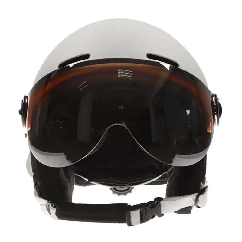 Moon ski helmet in black with polycarbonate shell and retractable visor on white background