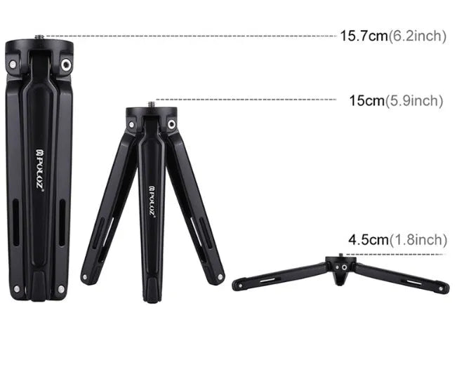 Metal mini tripod with non-slip rubber feet, 15cm max height, black, on uneven outdoor surface