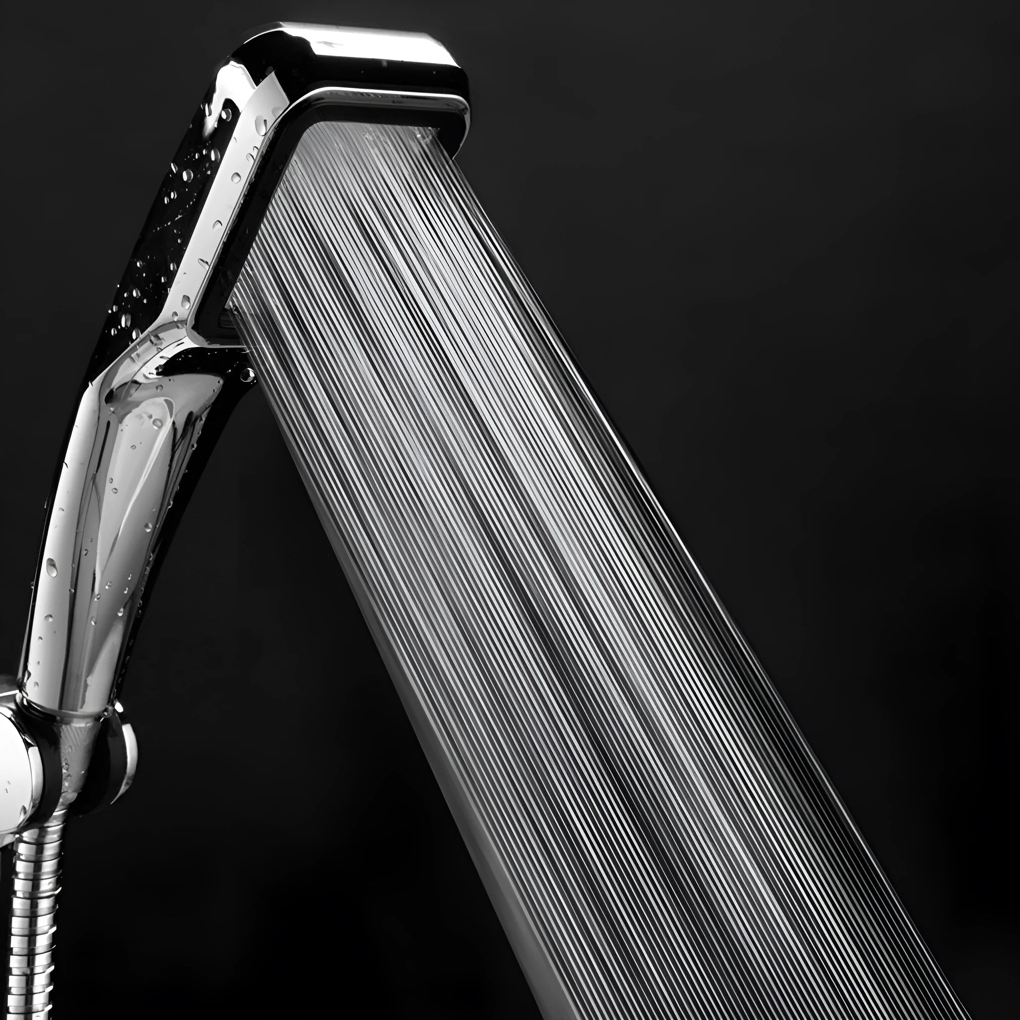 Orange hand-held rain shower set with wall bracket and connection hose