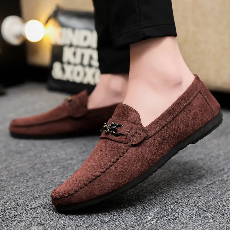 Men's black waterproof PU slip-on loafers with a round toe and low stiletto heel on a rubber sole.