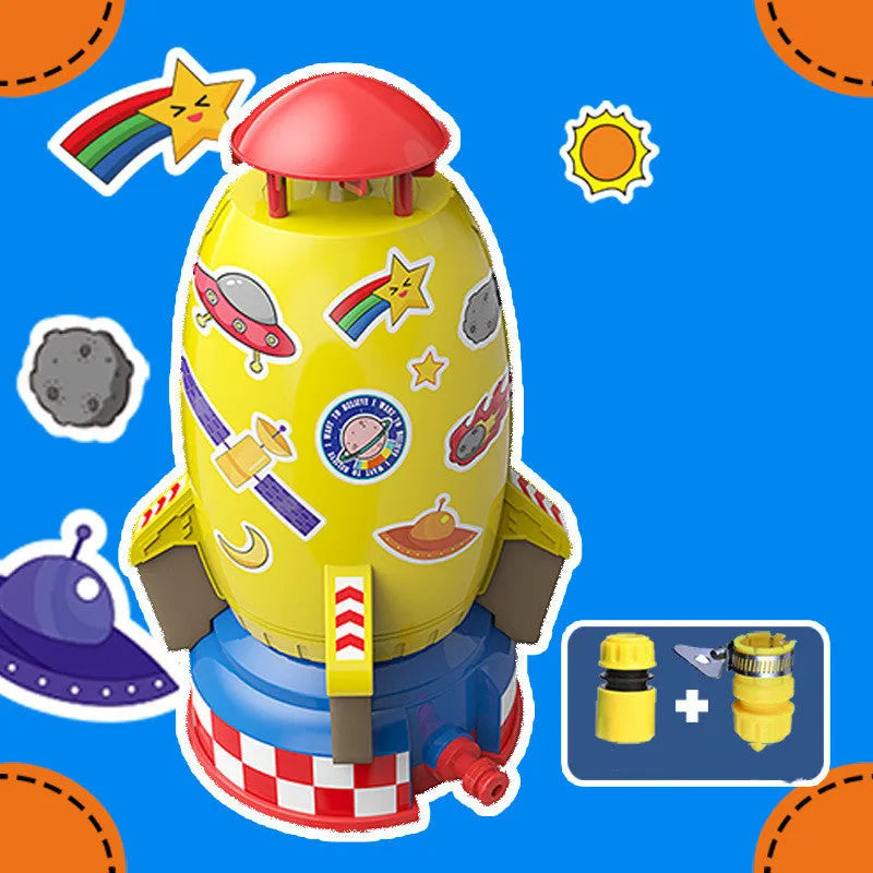 Water pressure rocket launcher toy on green grass with water spray, yellow rocket, and base connector