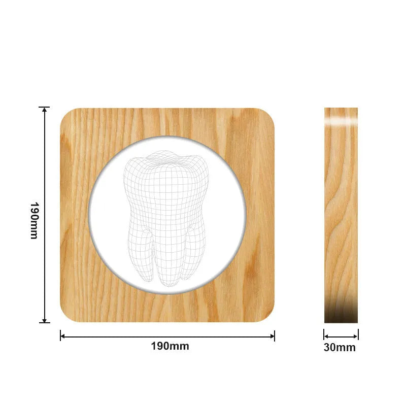 Tooth shaped wood coloured plastic USB night lamp on a surface