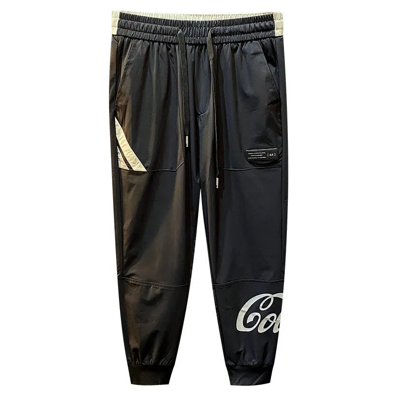 Black men's cropped trousers with elasticated ankle bands in ultra-thin ice silk cotton fabric