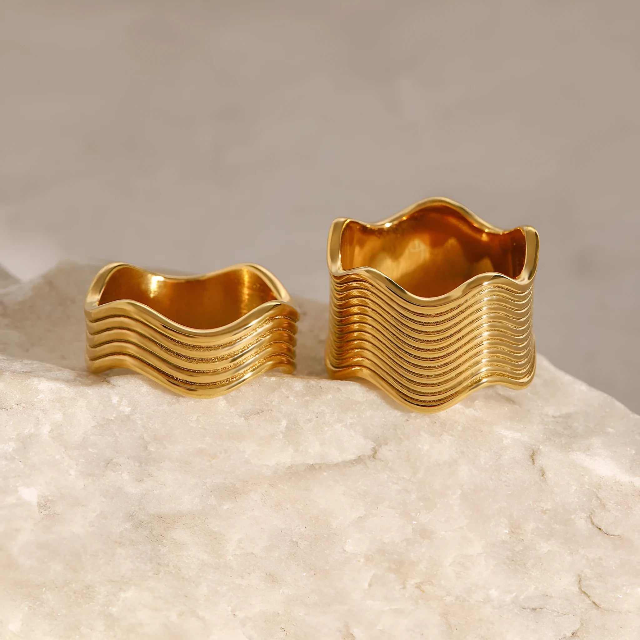 Women's stainless steel geometric wave ring with wide band surface and Korean style design
