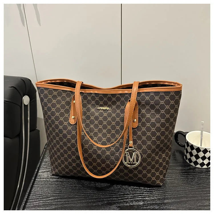 Black PU leather street-style shoulder bag with sewing thread detail, shown next to grey, brown, and white colour options.