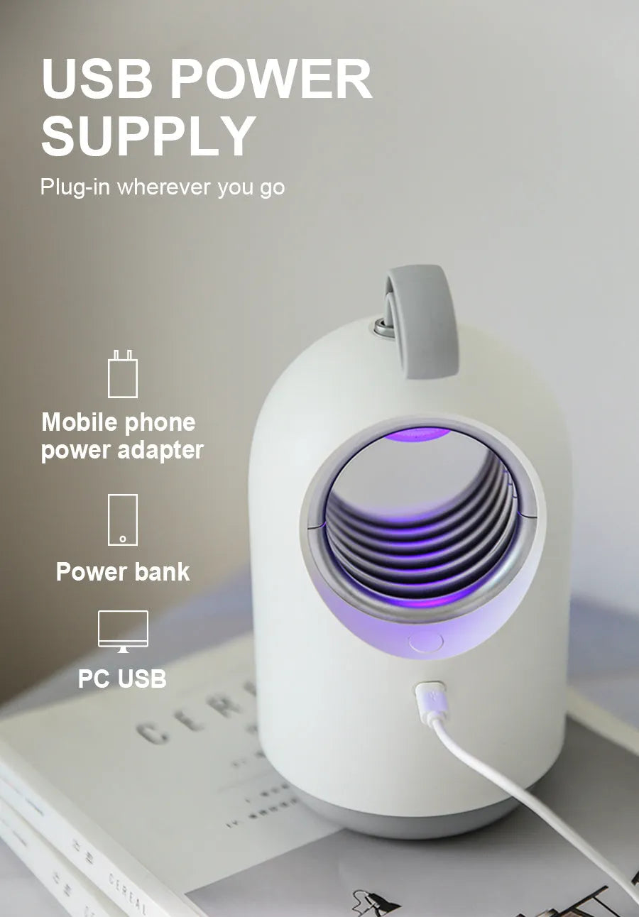 White and blue portable mosquito killer lamp with UV light, fan, and carry handle