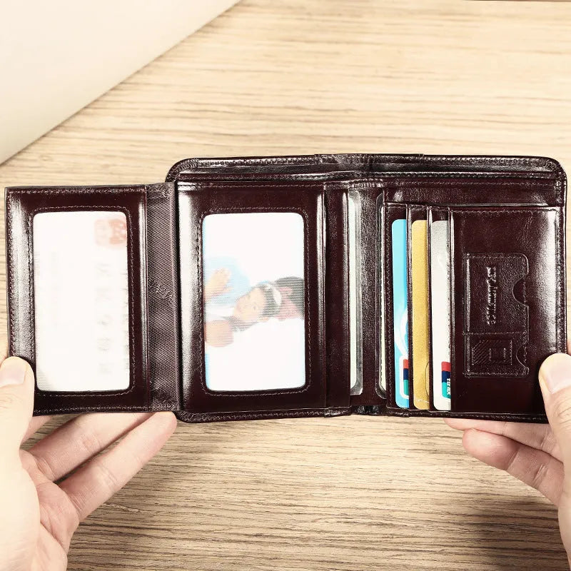 Men's leather wallet showing internal compartments for cards, cash, coins and documents