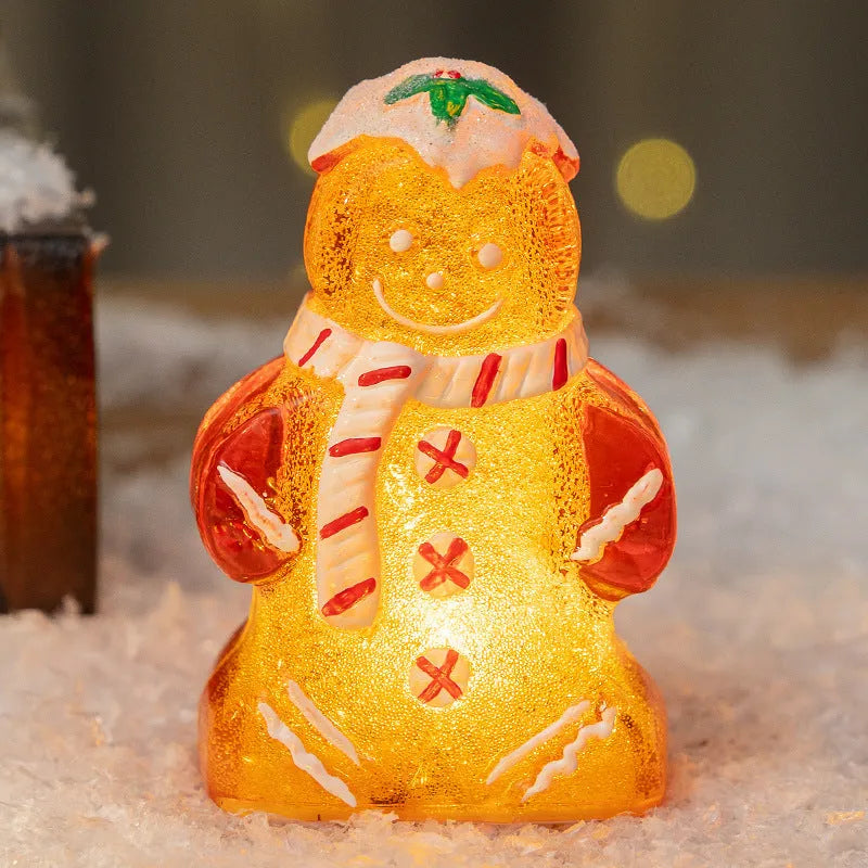 Glowing plastic gingerbread man Christmas ornament with a scarf in one of four colour options.