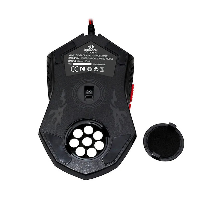 Black and red wired USB gaming mouse with six buttons on an office desk.