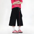 Black and red wide leg denim cropped pants with multiple pockets and mid waist