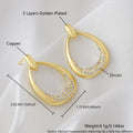 Yellow gold geometric drop earrings with zircon detailing on copper base, measuring 2.6cm