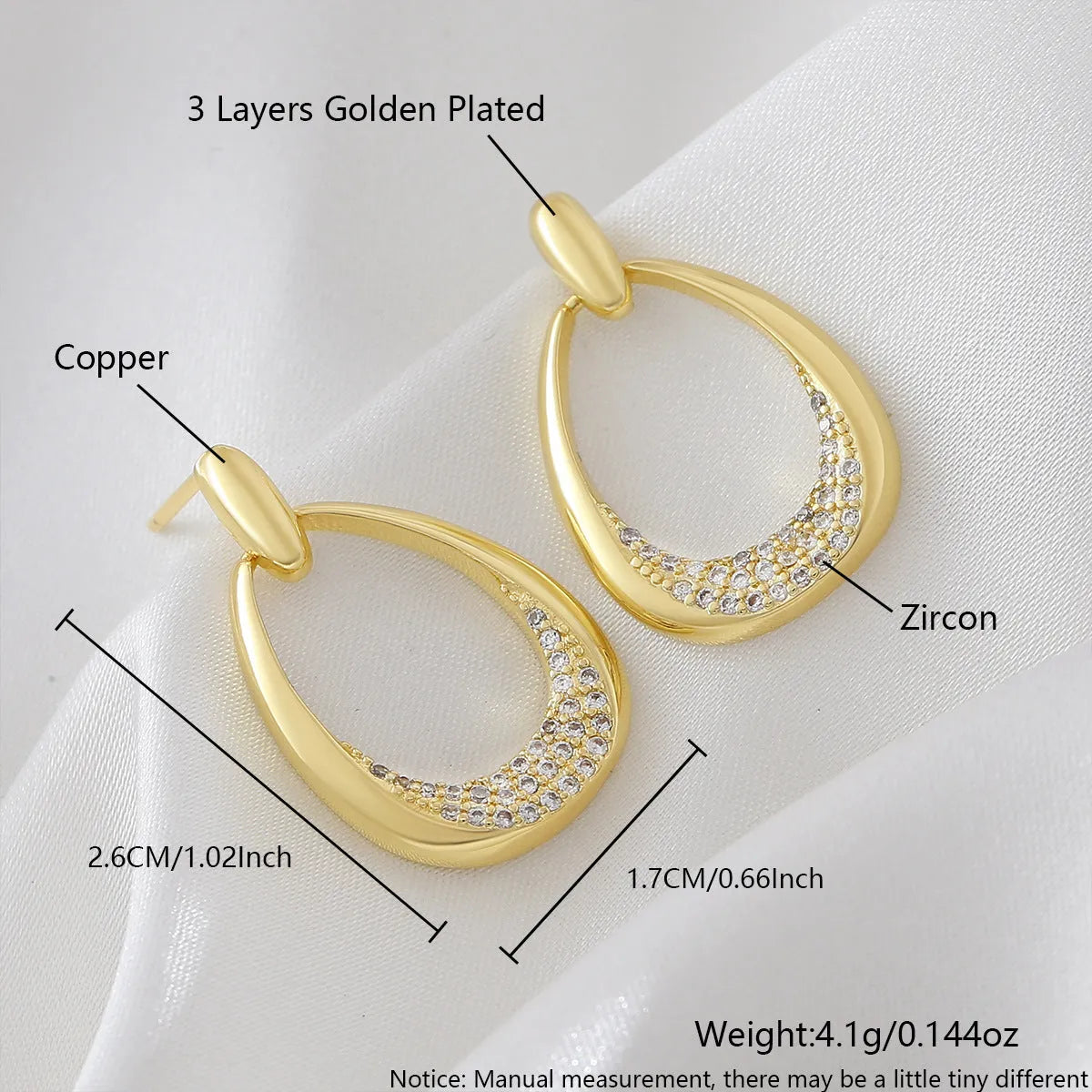 Yellow gold geometric drop earrings with zircon detailing on copper base, measuring 2.6cm
