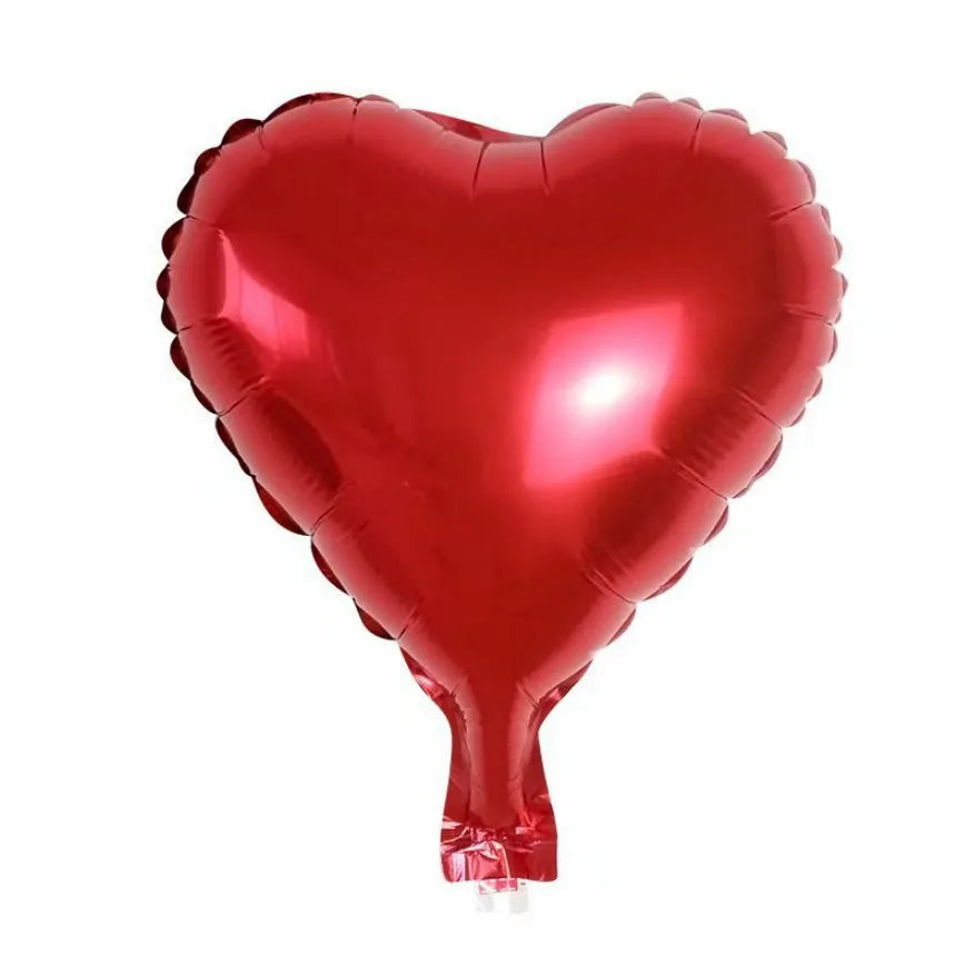 Five sparkling peach heart shaped aluminium balloons in assorted colours for party decoration.