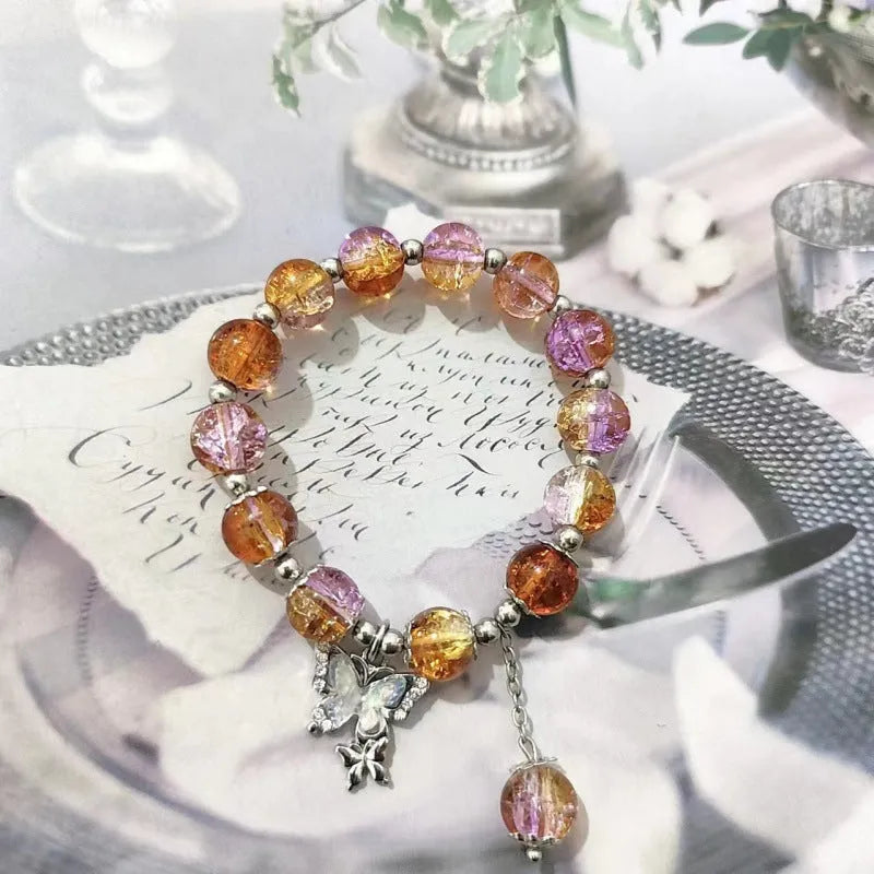 Chinese style glass bracelet with bamboo joint details in a red Lvzhu Duobao design.