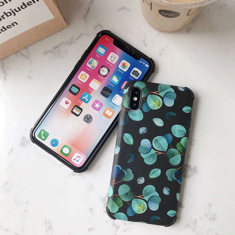 Black silicone leaf design phone case for iPhone models on a plain background.