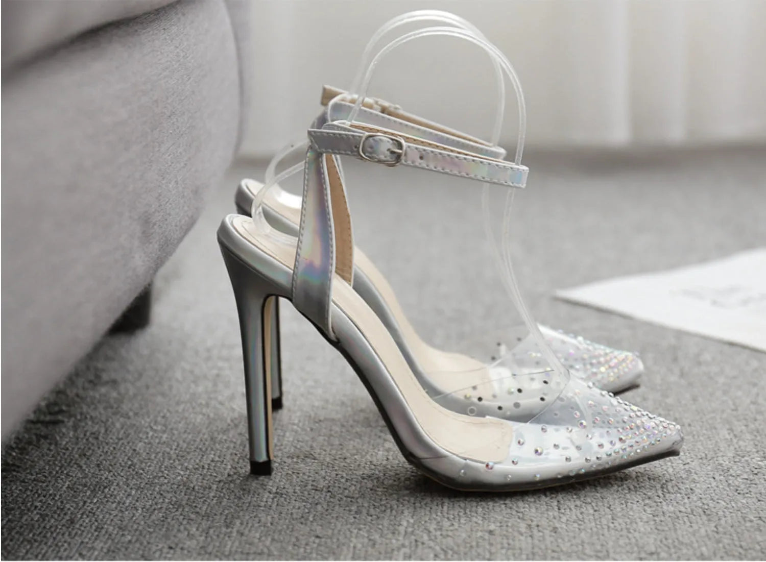 Women's pointed toe diamond sandals with stiletto heels on a white background