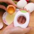 Kitchen egg topper gadget in blue with stainless steel cutting edge on suction card packaging