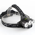 Head-mounted LED torch with long-range beam for outdoor camping and hiking activities.