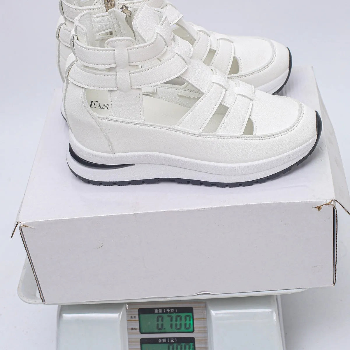 Women's black close-toed hollow-out platform sandals with Velcro fastening showing round toe design