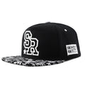 Cotton baseball cap with dome crown and embroidered letters in black or white colour