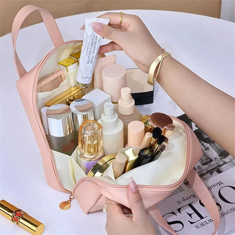 Shell shape PU leather waterproof cosmetic bag in milk apricot white with metal zipper