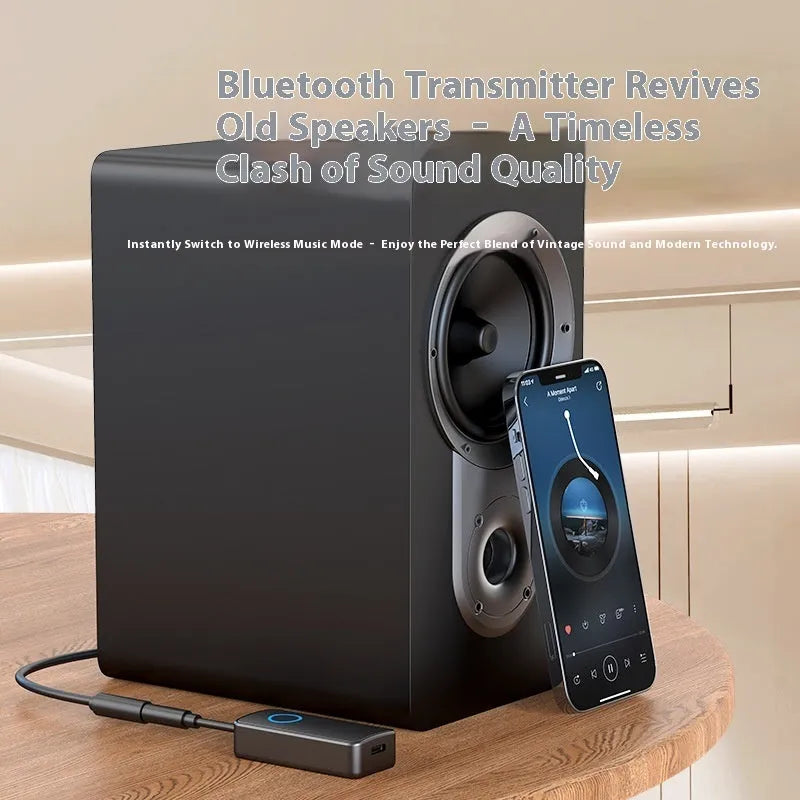 Small black Bluetooth audio adapter with a 3.5mm plug for wireless music streaming.
