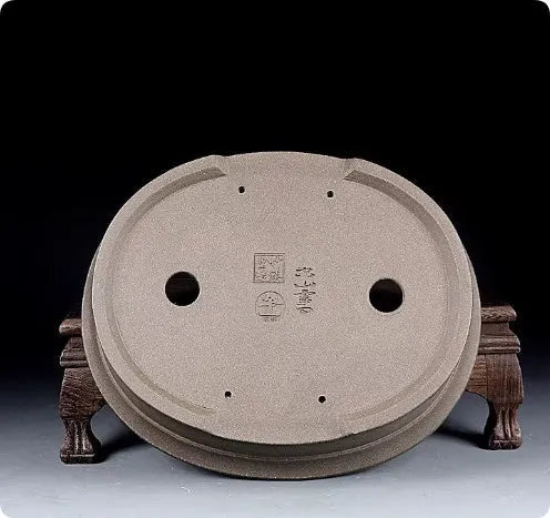 Handmade purple sand ceramic oval bonsai flower pot showing antique finish and 25cm length.