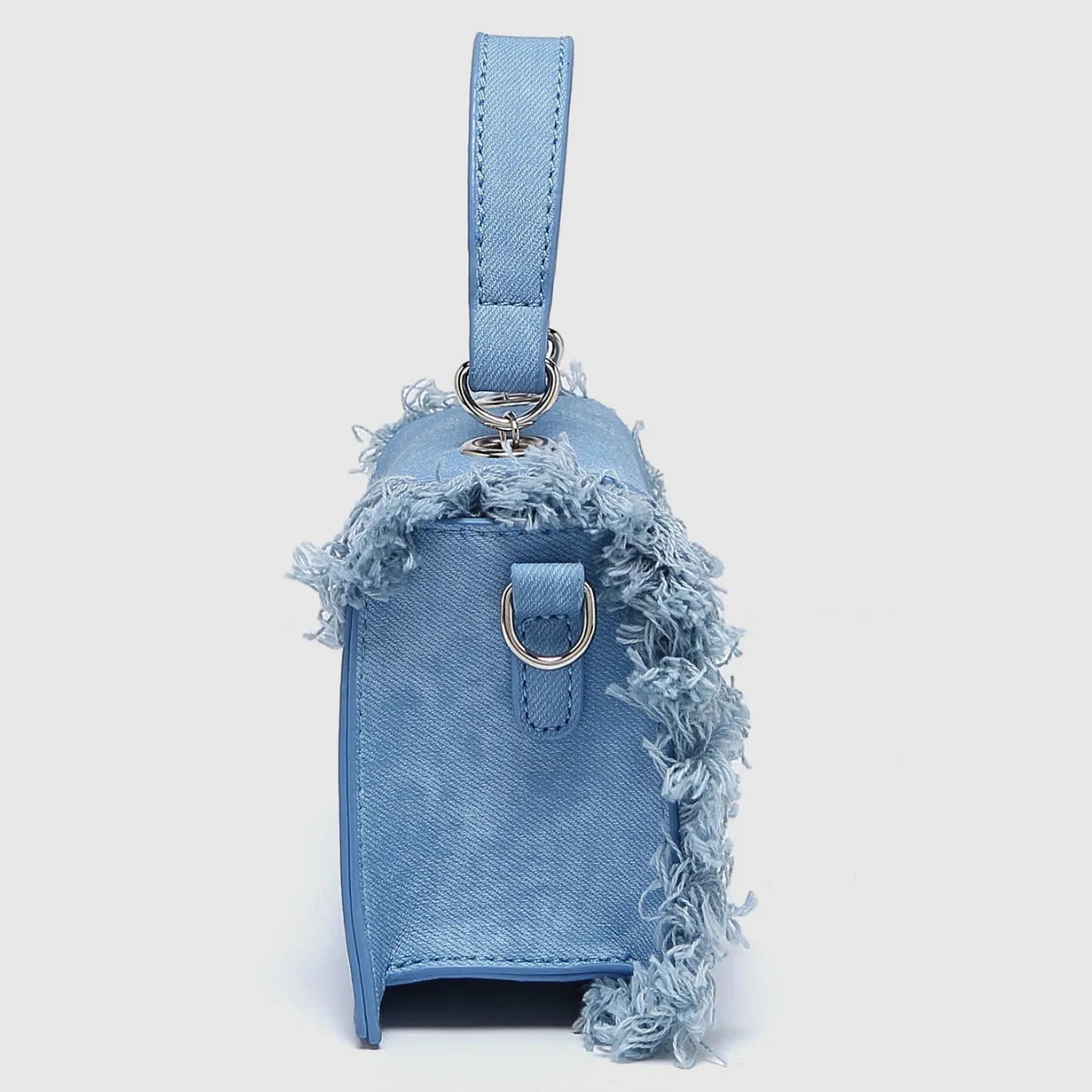 Retro tassel bag mini crossbody bag in denim blue colour, PU material, with tassel detail and crossbody strap.
