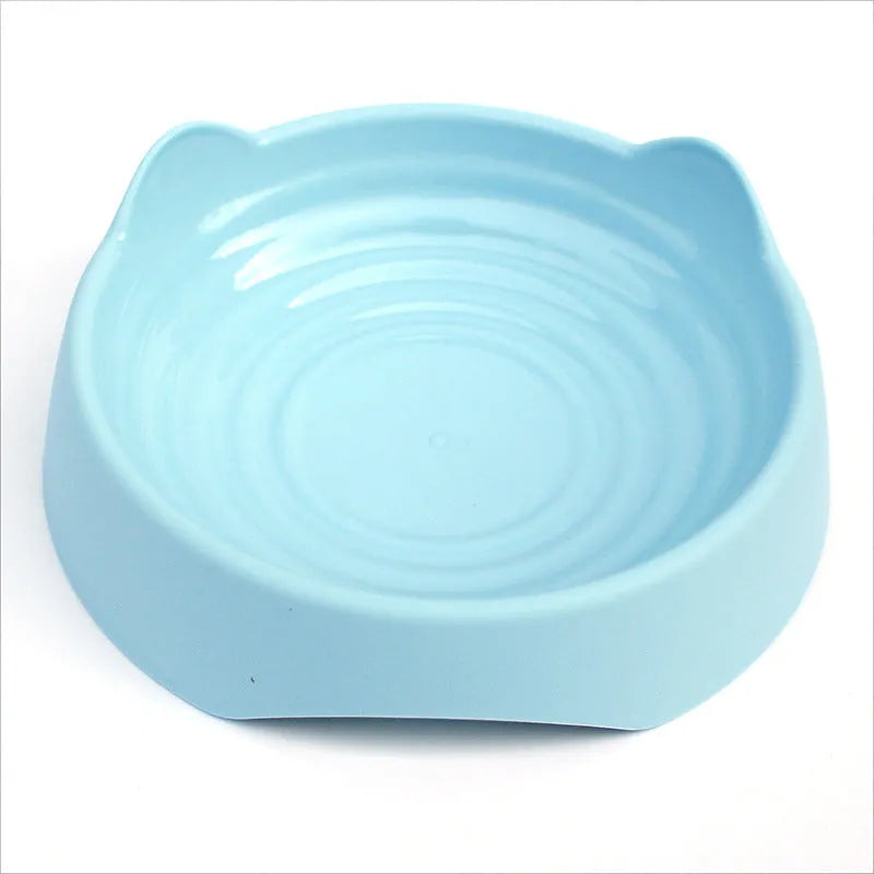 Ceramic dog slow feeder bowl in blue, green, or pink with puzzle maze design for large or small dogs