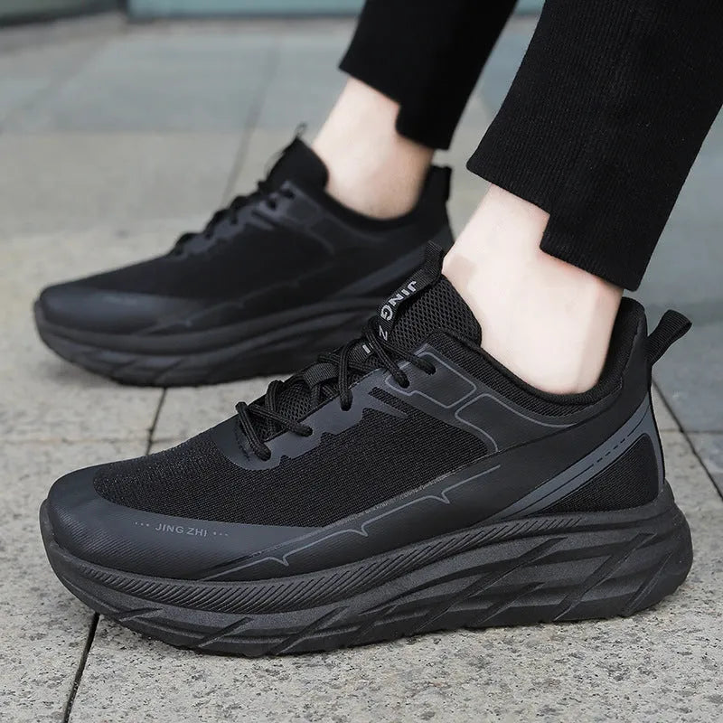 Mens thick-soled anti-skid lace-up running sneakers with rubber sole in black and grey colour options