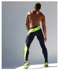 Men sports tight stretch fitness pants in breathable nylon, black blue colour, tight fit for running and gym training