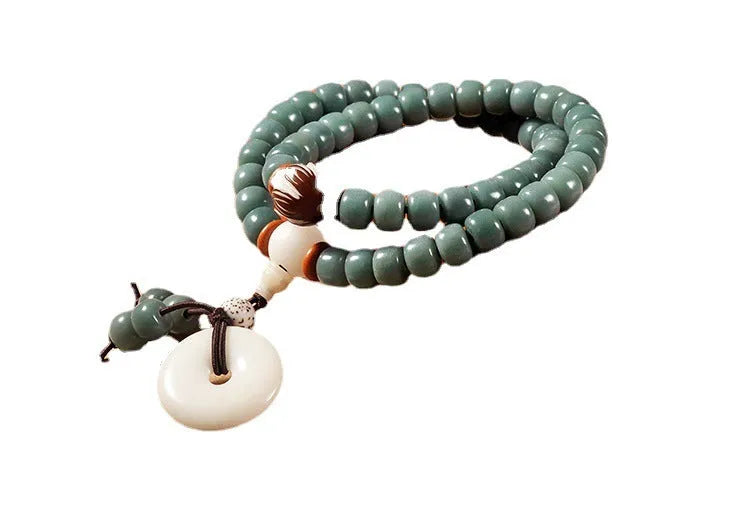 Natural bodhi seed bracelet with double ring safety buckle and lotus bead design
