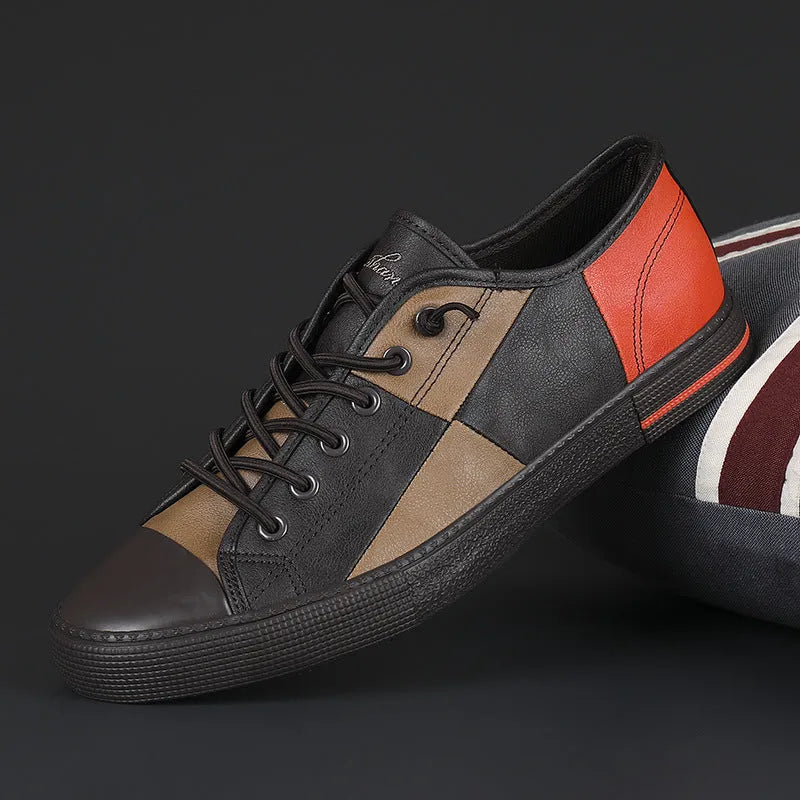 Men's colour contrast leather slip-on shoes with round toe and flat rubber sole.