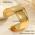 Gold plated wide stainless steel bracelet with a geometric wave shape and a niche opening.