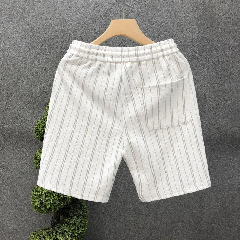Men's black and white striped fleece-lined casual shorts with an elastic waistband