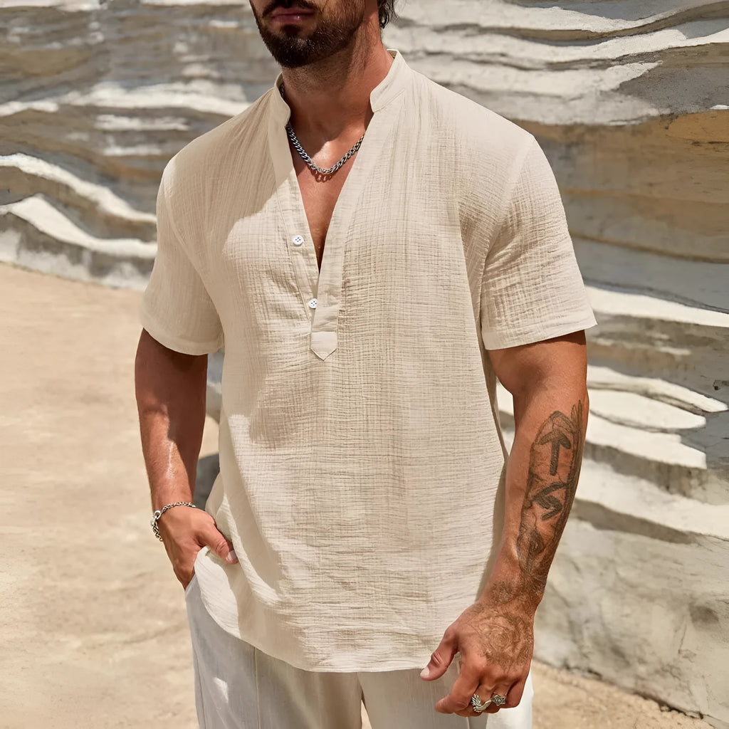 Men's light blue short-sleeved casual shirt with a stand collar.